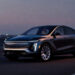 Cadillac LYRIQ electric SUV parked on open road showing full exterior design